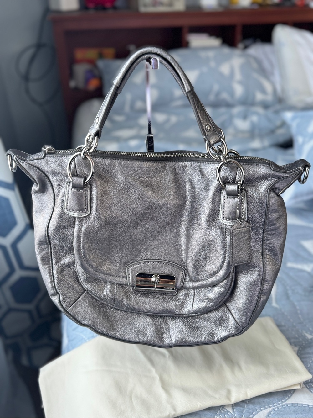 Coach Kristin metallic silver leather front flap hobo satchel.